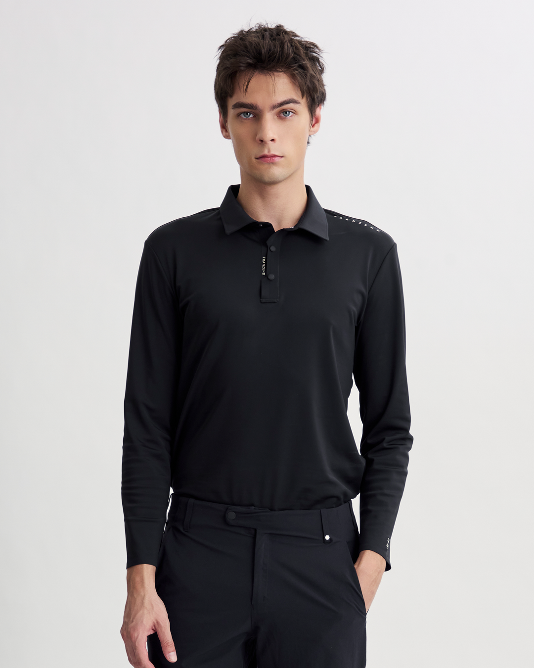 AW26 Golf 男款釘釦長袖 Polo 衫・黑色正面
