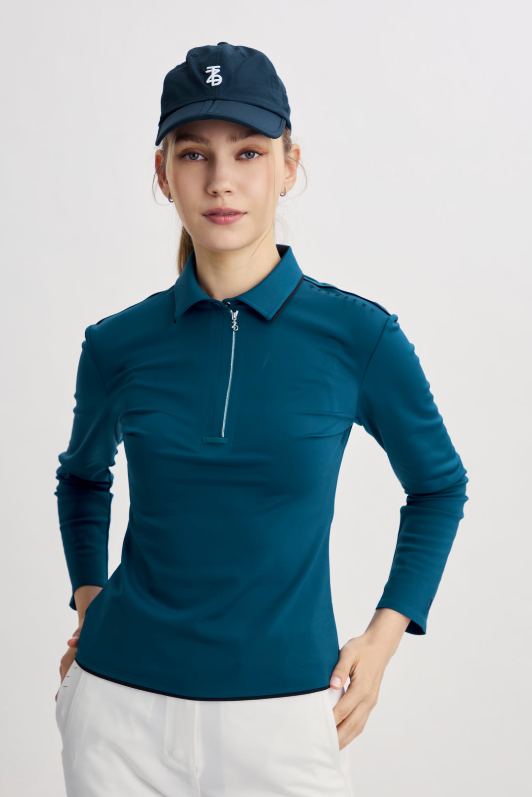 AW26 Golf 女款拉鍊長袖 Polo 孔雀藍正面
