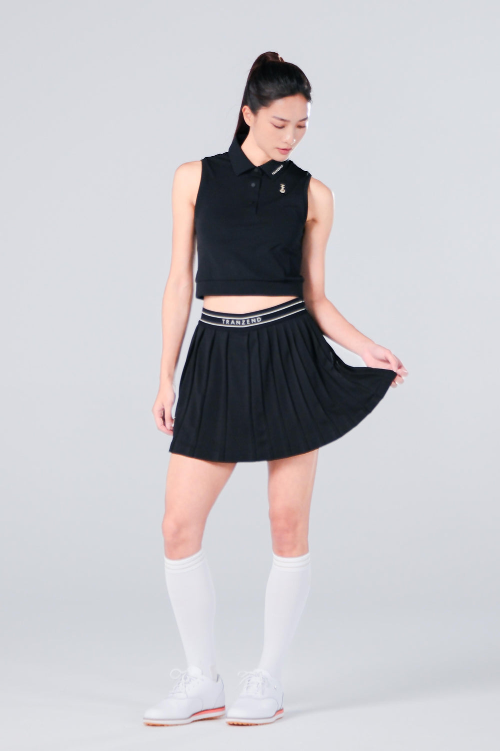 TRANZEND 短版背心Polo衫 女 黑 EC照