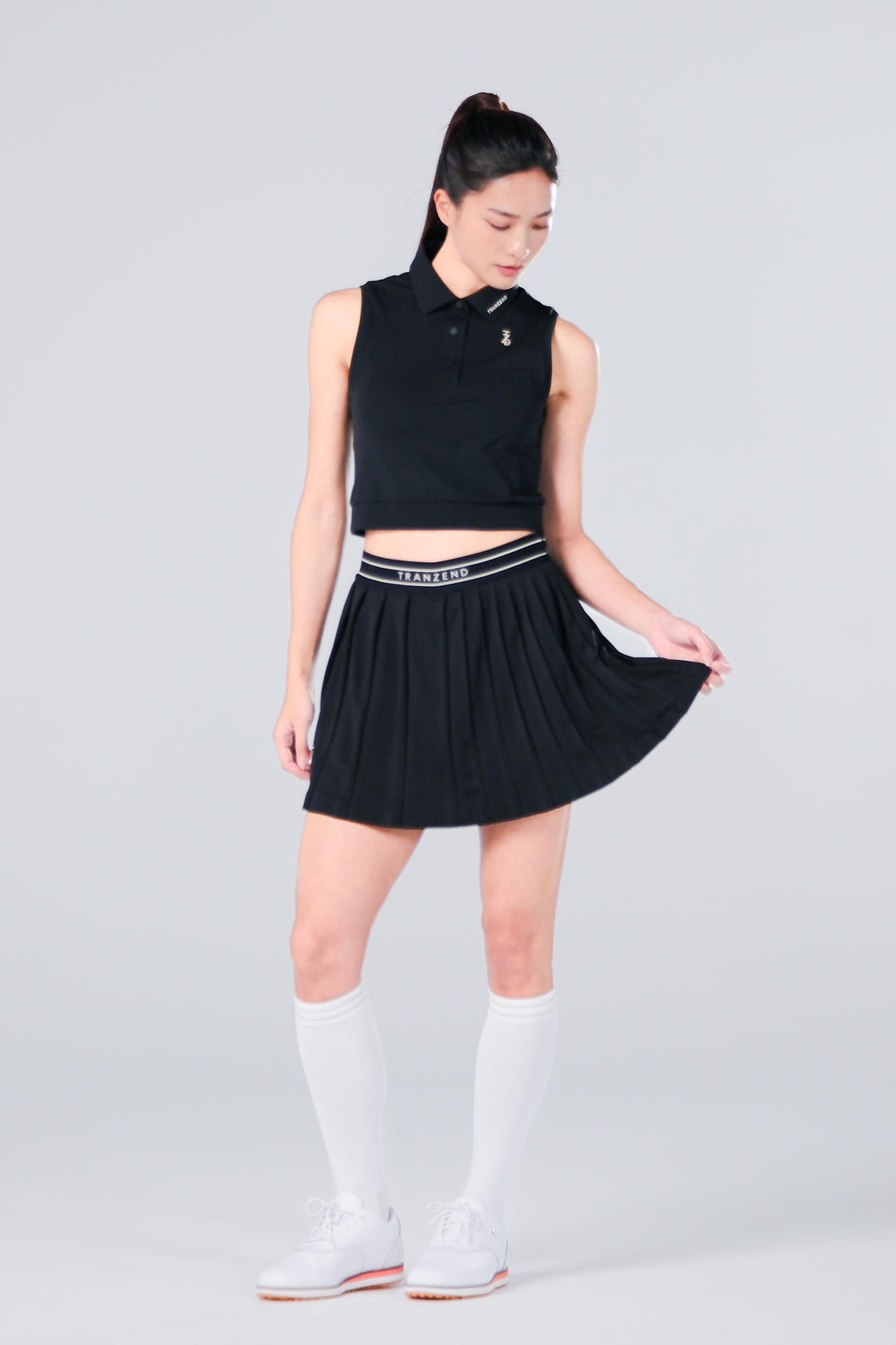 TRANZEND 短版背心Polo衫 女 黑 EC照
