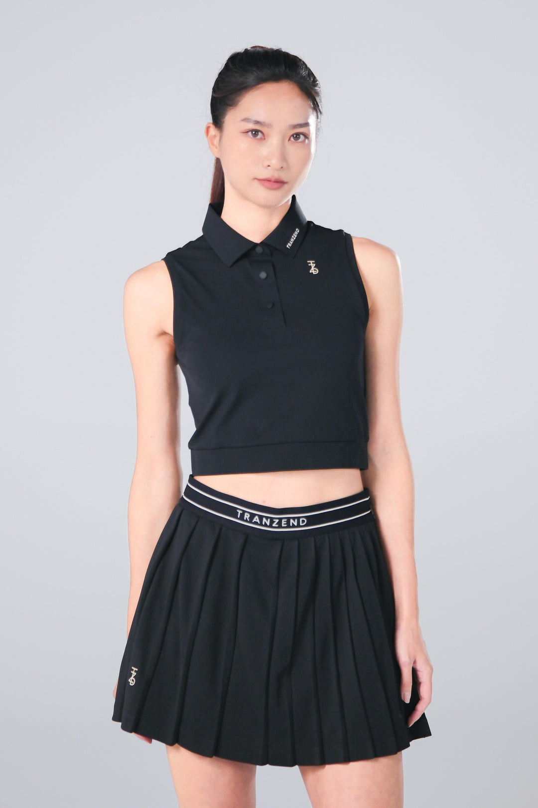 TRANZEND 短版背心Polo衫 女 黑 EC照