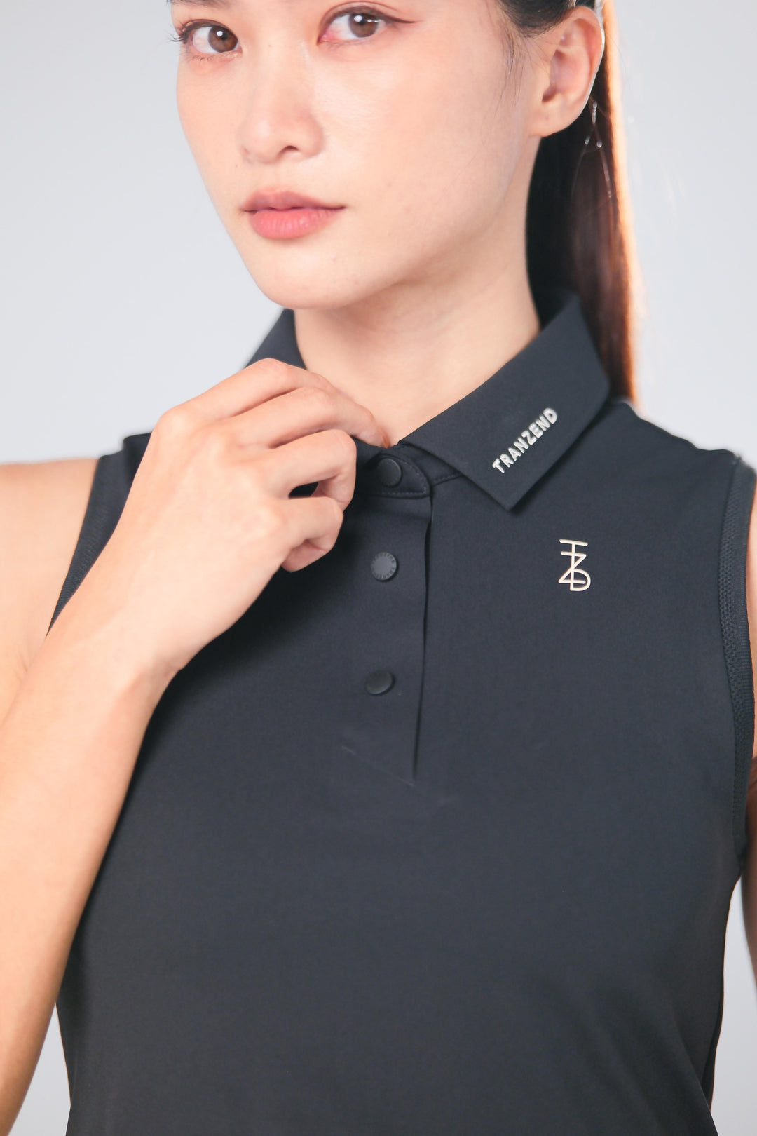 TRANZEND 短版背心Polo衫 女 黑 EC照