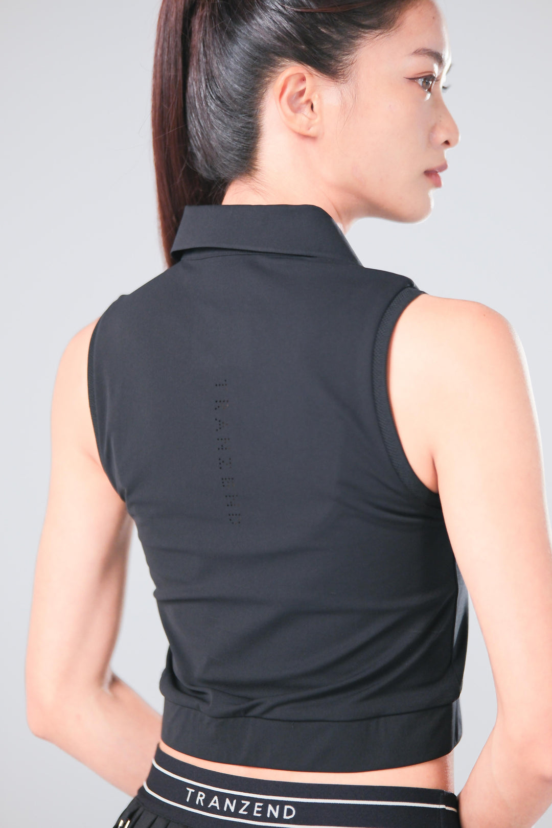 TRANZEND 短版背心Polo衫 女 黑 EC照