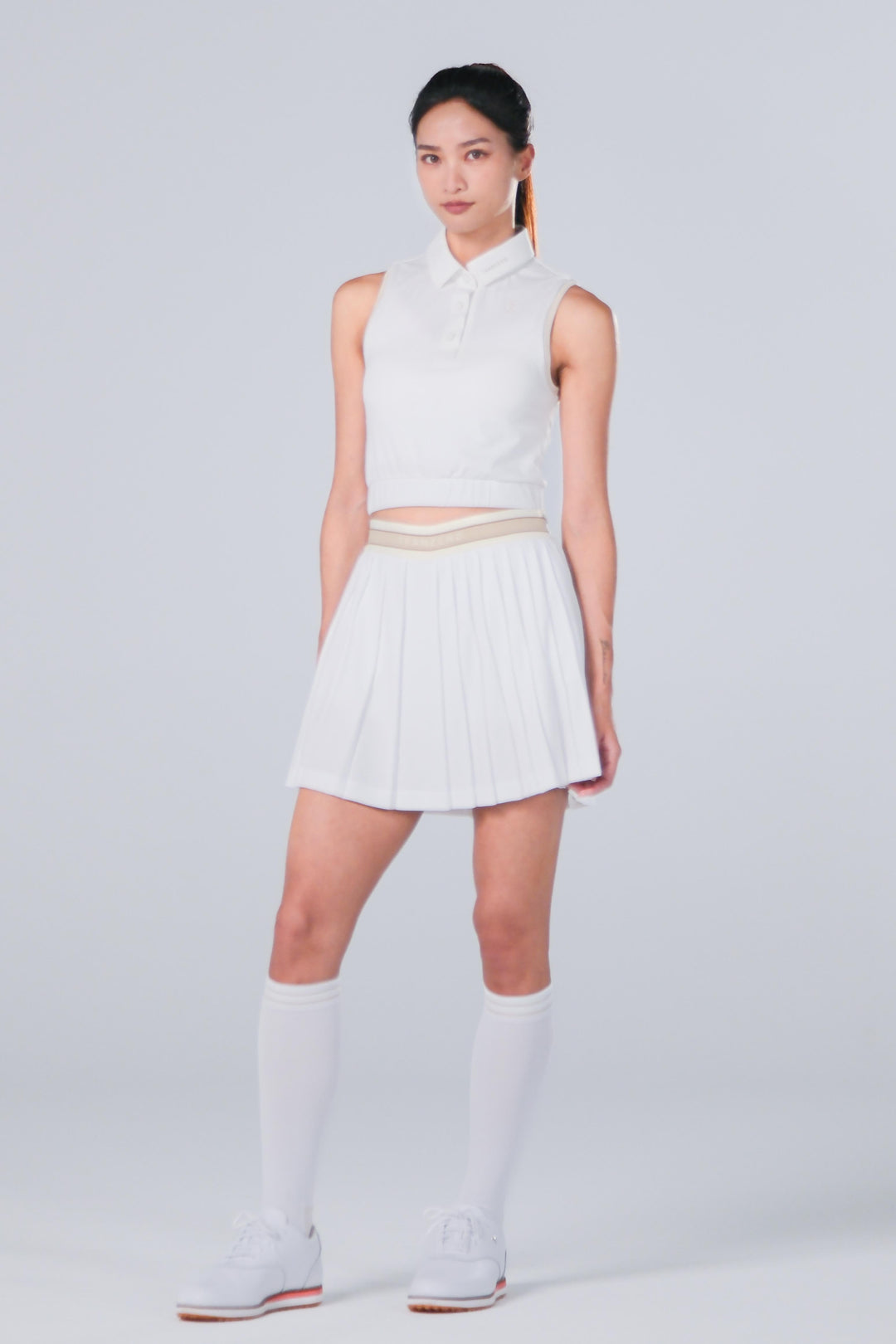 TRANZEND 短版背心Polo衫 女 白 EC照